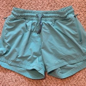 Athleta girl teal pre-owned shorts XL 14